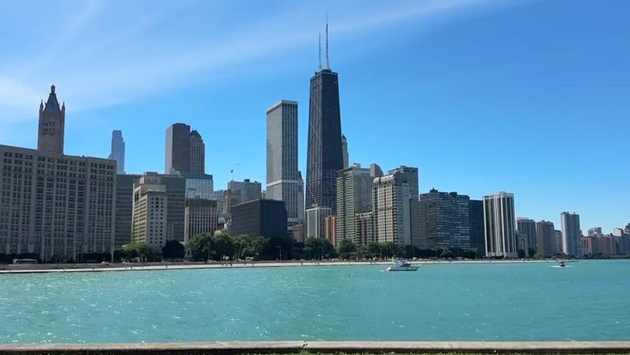 Chicago skyline and turquoise lakefront on a clear summer day