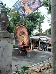Traditional street performance with lion dance and martial arts in Mojogedang