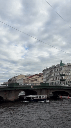 Canal boat and overcast streets in central Saint Petersburg