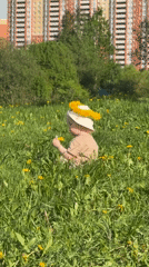 Mother and child enjoy dandelion crown picnic in Vladimir