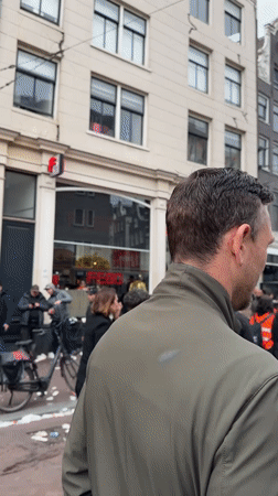 King's Day celebrations draw orange-clad crowds to Amsterdam streets
