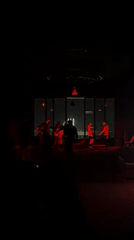 Red-lit indoor venue captured on video in Yerevan
