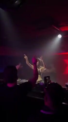 Female DJ performs early morning set at Prior Velho nightclub