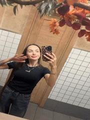 Young women document cafe visit, selfies in Izhevsk
