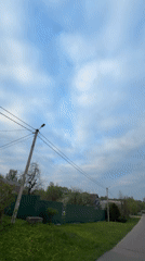 Family stroll with toddler documented in Reshetnikovo, Russia