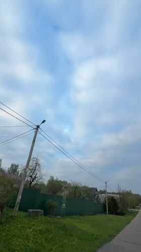 Family stroll with toddler documented in Reshetnikovo, Russia