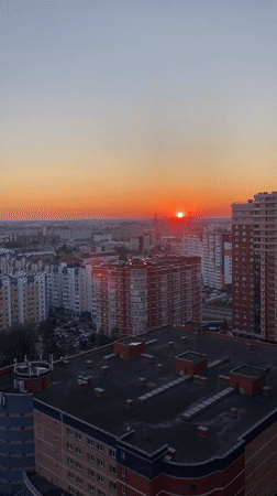 Surgut summer sunset, captured from above and street level