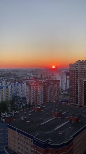 Surgut summer sunset, captured from above and street level