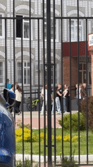 Teenagers gather outside building in Tolyatti, Russia