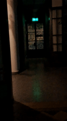 Interior hallway with exit documented in Catamarca building