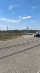 Early morning street racing gathering draws crowds in Chigiri, Russia