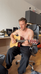Acoustic guitar session in a Murino apartment, midday