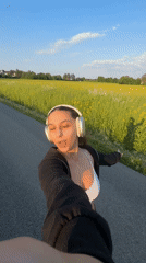 Woman records selfie video while walking in Mönchengladbach
