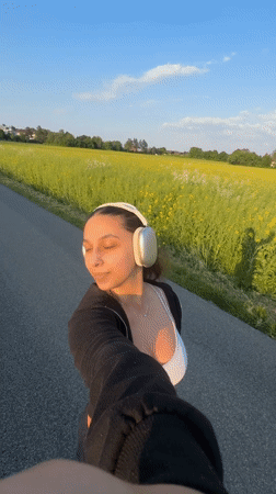 Woman records selfie video while walking in Mönchengladbach