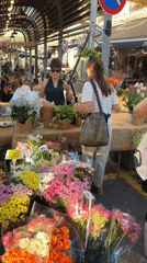 Tel Aviv market overflows with flowers and fresh produce