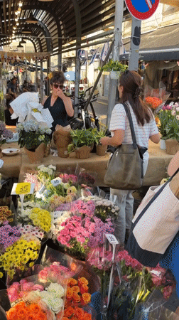Tel Aviv market overflows with flowers and fresh produce