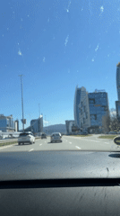 Driver documents Sofia's evolving skyline from highway