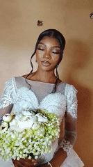 Bride in white dress filmed in Nigeria village