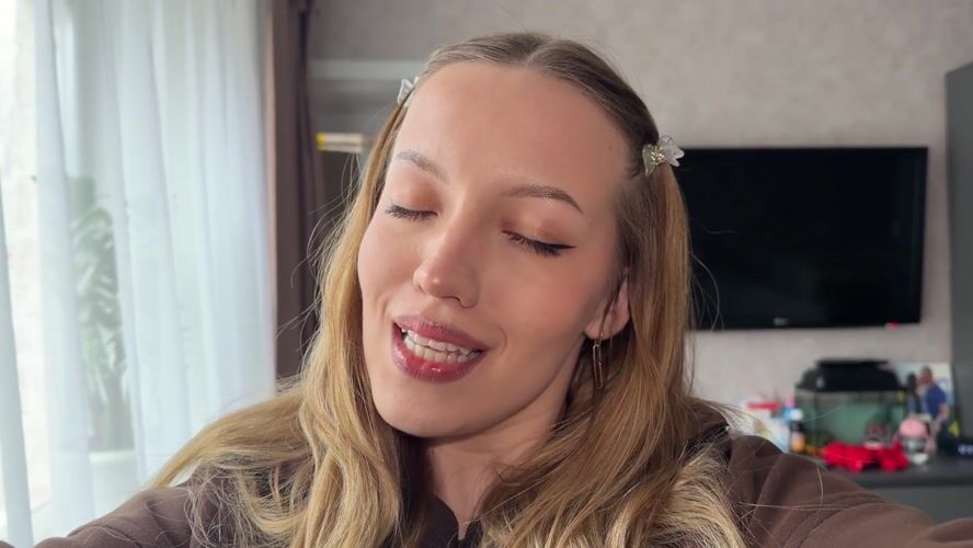 Woman films selfies with butterfly clips in Reshetnikovo