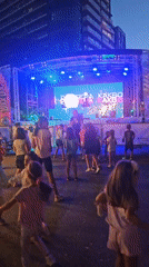 Kids dance at an outdoor stage event in Burgas
