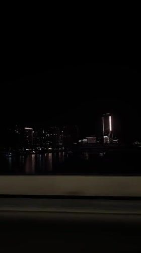 Belgrade skyline captured at night from moving vehicle