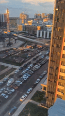 Golden hour city views from a high-rise, plus dinner