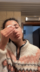 Woman's Evening Skincare Routine Captured in Sutomore Bathroom
