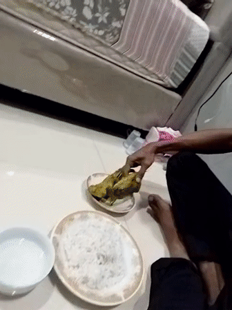 Man enjoys traditional meal in Kutaglumpang home