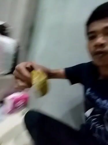 Man enjoys traditional meal in Kutaglumpang home