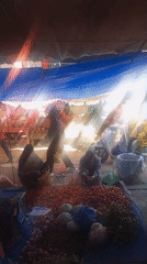 Late-night vegetable market operates in Lhokseumawe, Indonesia