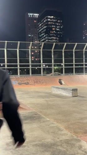 Skateboarder practices nighttime tricks at Buenos Aires skatepark