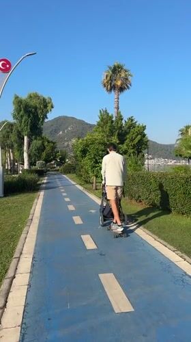 Morning activity along Fethiye's blue waterfront path