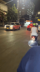 Evening traffic flows through busy Nha Trang streets