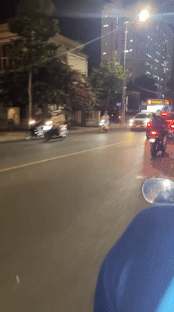 Evening traffic flows through busy Nha Trang streets