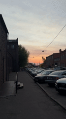 Evening street scene captured in Minsk during sunset hours
