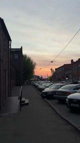 Evening street scene captured in Minsk during sunset hours