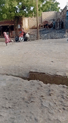 Daily life documented on dusty streets of Dakata, Nigeria
