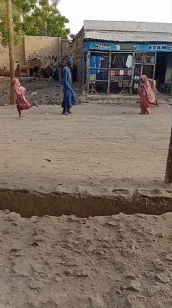 Daily life documented on dusty streets of Dakata, Nigeria