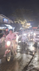 Patong's tourist strip in full swing on a rainy night