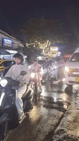 Patong's tourist strip in full swing on a rainy night