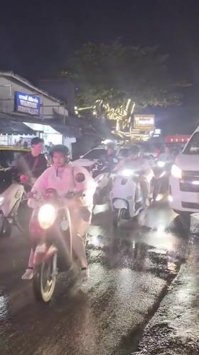 Patong's tourist strip in full swing on a rainy night
