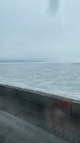 Water body observed from concrete barrier in Chaykovsky, Russia