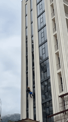 Worker rappels down high-rise building in Montenegro