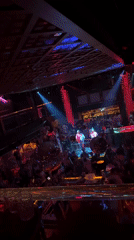 Sofia nightclub buzzing with dancers and colorful lights