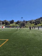 Soccer goalkeeper makes save during Barcelona match