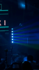 Moscow venue interior captured with stage lights and chandeliers