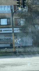 Man falls from tall unicycle on Sofia street