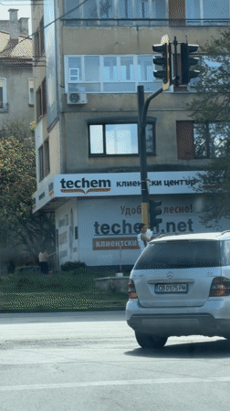 Man falls from tall unicycle on Sofia street