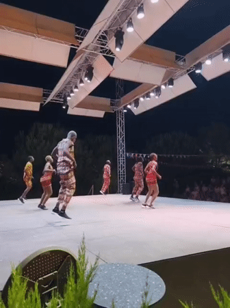 Traditional dance performance on outdoor stage in Kuşadası
