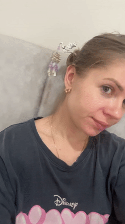 Woman in Disney shirt photographed in Batumi, Georgia